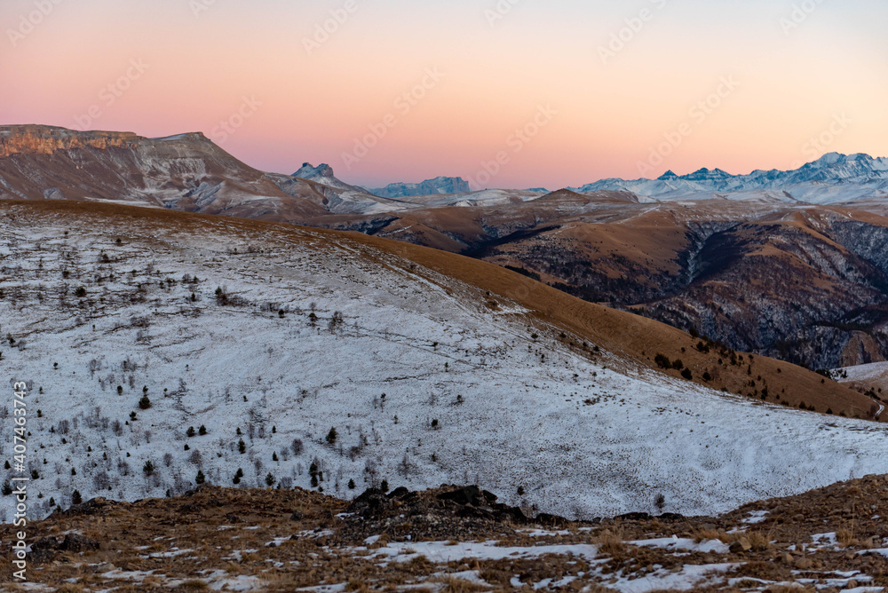 mountain plateau in the rays of sunset, beautiful gradient sky. Location Russia, Karachay-Cherkessia. Shajatmaz plateau