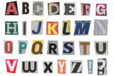 full alphabet of uppercase letters cut out from newspapers