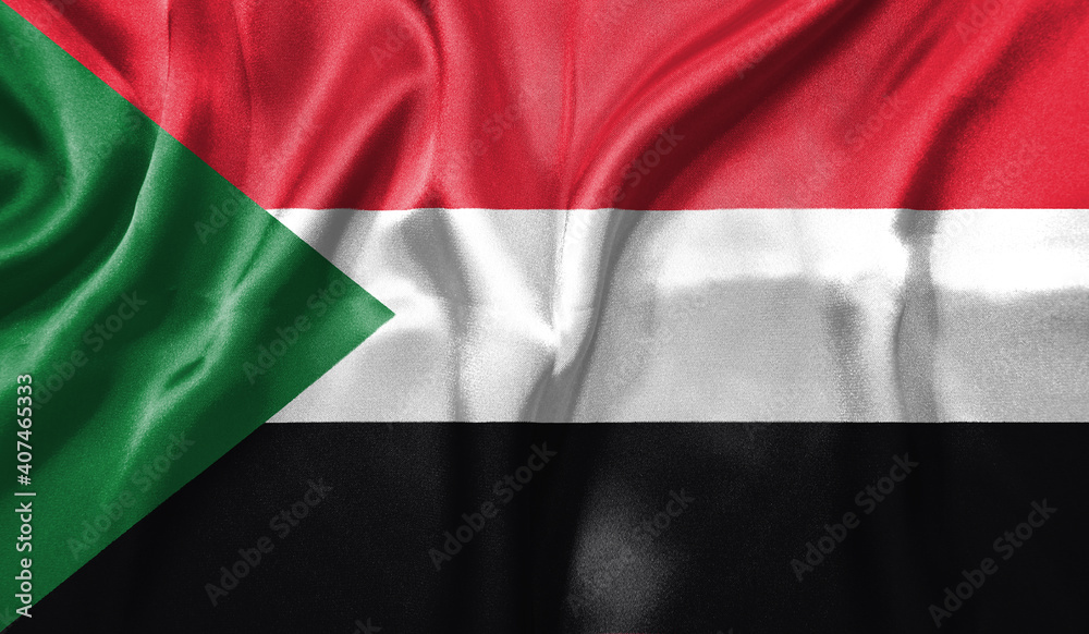 Obraz premium Sudan flag wave close up. Full page Sudan flying flag. Highly detailed realistic 3D rendering