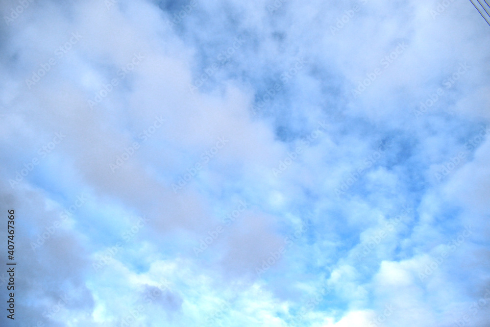 white clouds on a blue sky background white clouds on a blue sky background