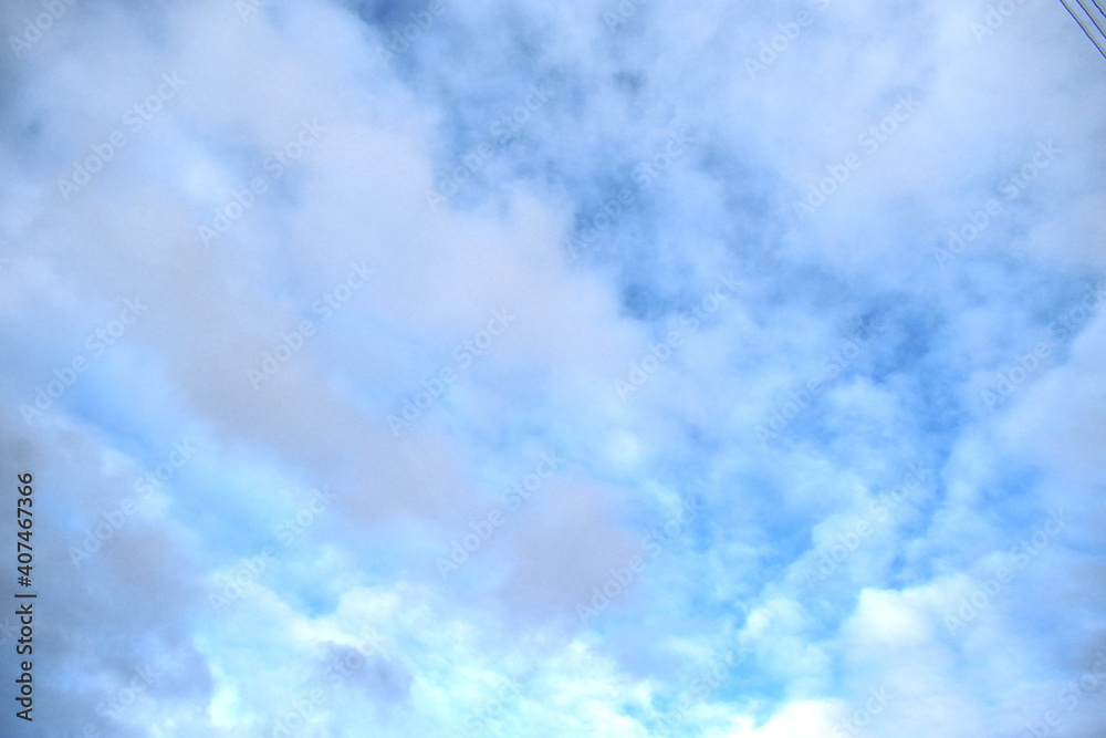 white clouds on a blue sky background