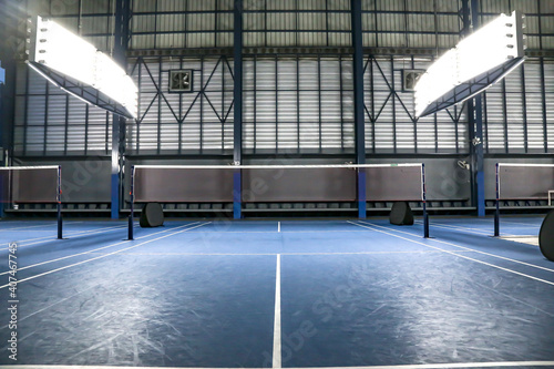 Old badminton back court side blue background