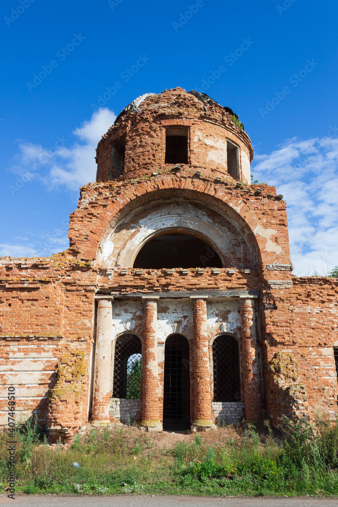 an abandoned red brick church building