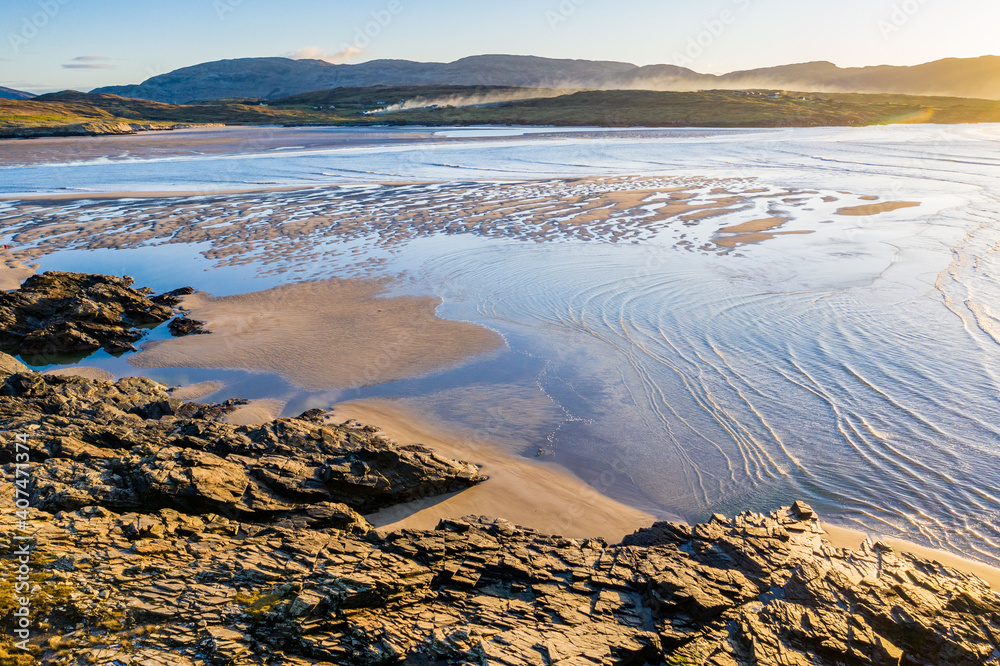 The coast between Kiltoorish bay beach and the Sheskinmore bay between Ardara and Portnoo in Donegal - Ireland The coast between Kiltoorish bay beach and the Sheskinmore bay between Ardara and Portnoo in Donegal - Ireland