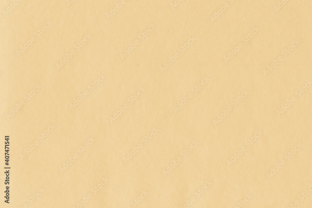 Clean yellow retro paper background. Vintage cardboard texture. Grunge paper for drawing. Simple blank fabric pattern.