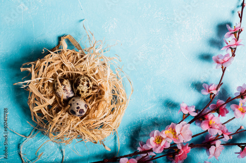 quail eggs inside nest in a easter background