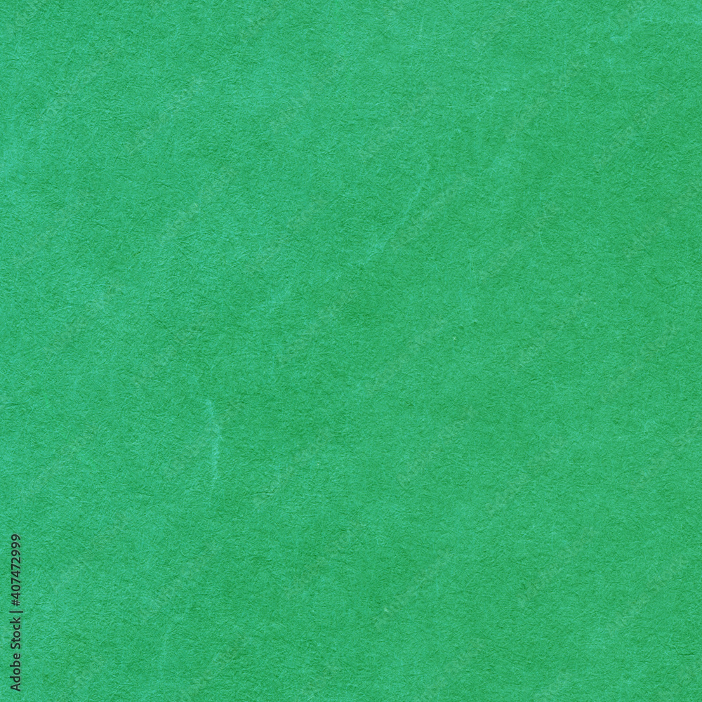 Fototapeta premium Cardboard green abstract pattern texture close-up. Retro old paper background. Grunge concrete wall. Vintage blank wallpaper.