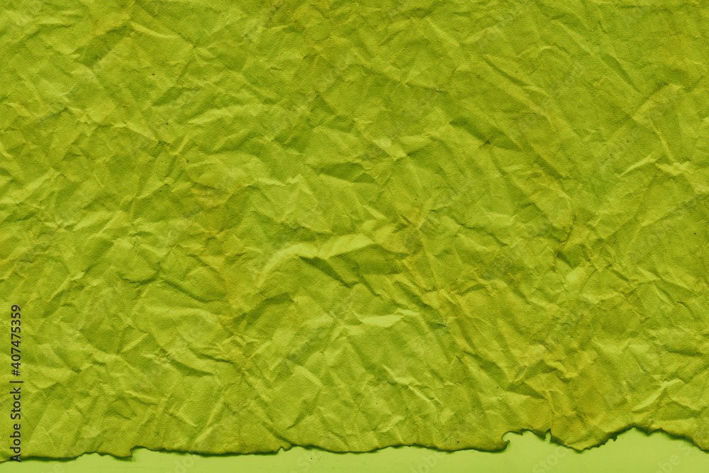 Fototapeta premium Cardboard green abstract pattern texture close-up. Retro old paper background. Grunge concrete wall. Vintage blank wallpaper.