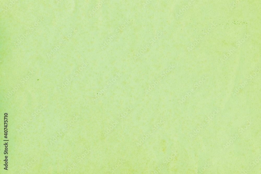 Cardboard green abstract pattern texture close-up. Retro old paper background. Grunge concrete wall. Vintage blank wallpaper. Cardboard green abstract pattern texture close-up. Retro old paper background. Grunge concrete wall. Vintage blank wallpaper.