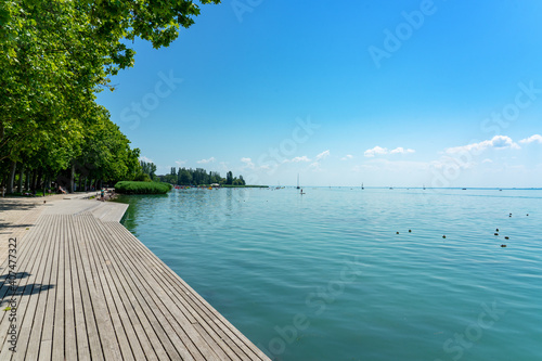 Promenade in Balatonfüred next to Lake balaton with wooden lakeside photo