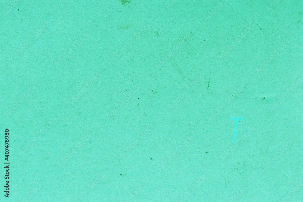 Obraz premium Cardboard green abstract pattern texture close-up. Retro old paper background. Grunge concrete wall. Vintage blank wallpaper.