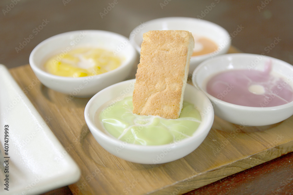 Slice steamed bread and pandan custard, Thai dessert