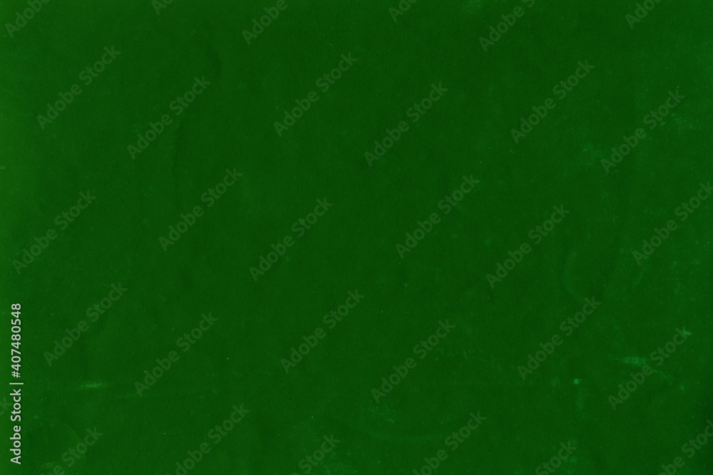 Cardboard green abstract pattern texture close-up. Retro old paper background. Grunge concrete wall. Vintage blank wallpaper. Cardboard green abstract pattern texture close-up. Retro old paper background. Grunge concrete wall. Vintage blank wallpaper.