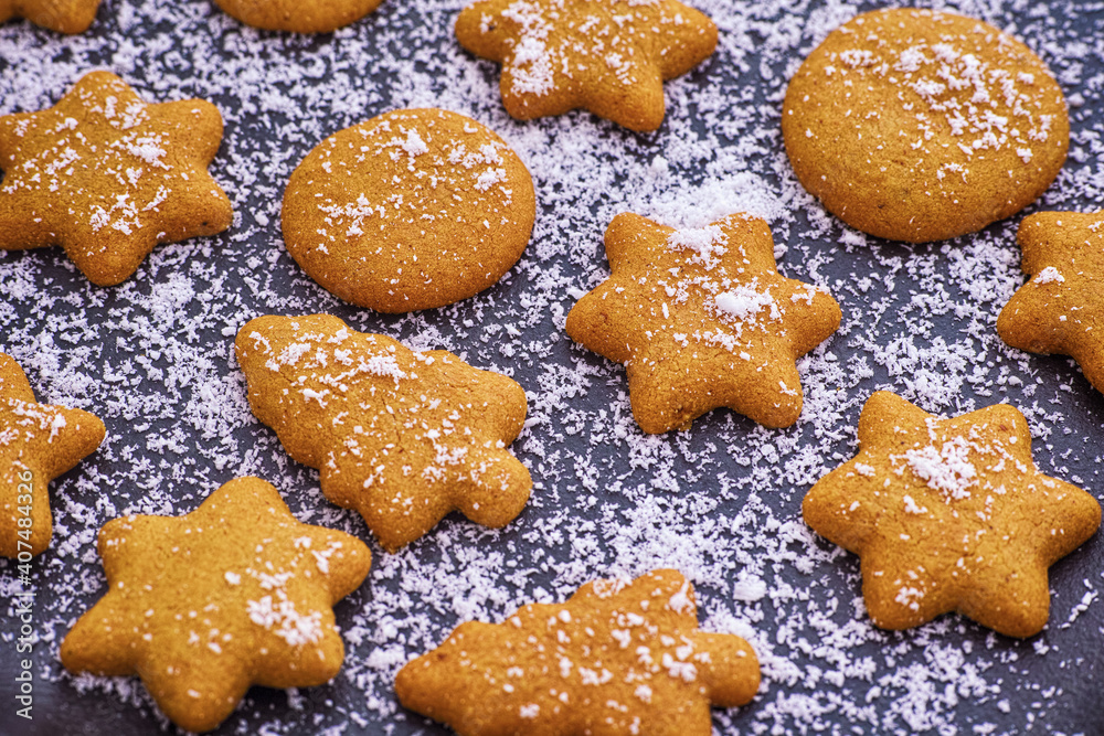 Baked gingerbread cookies with coconut powder