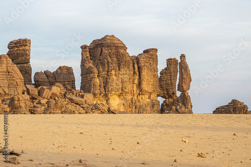 Early morning light drapes the eroded desert formation, The Ennedi Plateau, Chad, Africa