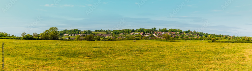 A panorama view across the fields towards the village of Napton, Warwickshire in summertime