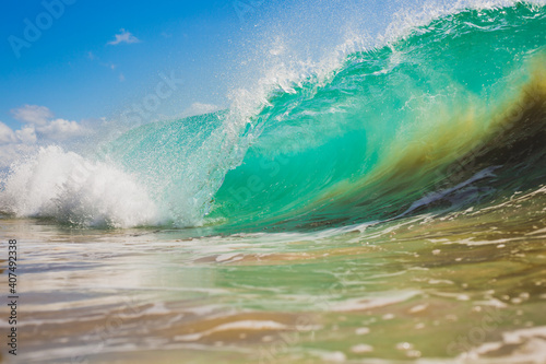 Fototapeta Naklejka Na Ścianę i Meble -  Turquoise blue wave breaking
