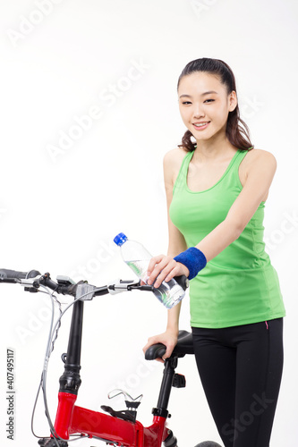 Young woman riding a bicycle