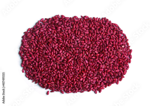 Rat poison. Red dyed grain of wheat against rats. Pile of seeds. Isolated. Pest protection