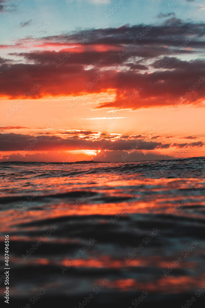 Sunset view of horizon at water level in ocean Sunset view of horizon at water level in ocean