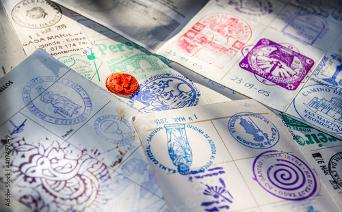 Albergue Hostel Stamps in Pilgrim Passport Credencial on Camino de Santiago St James Way Pilgrimage Trail photo