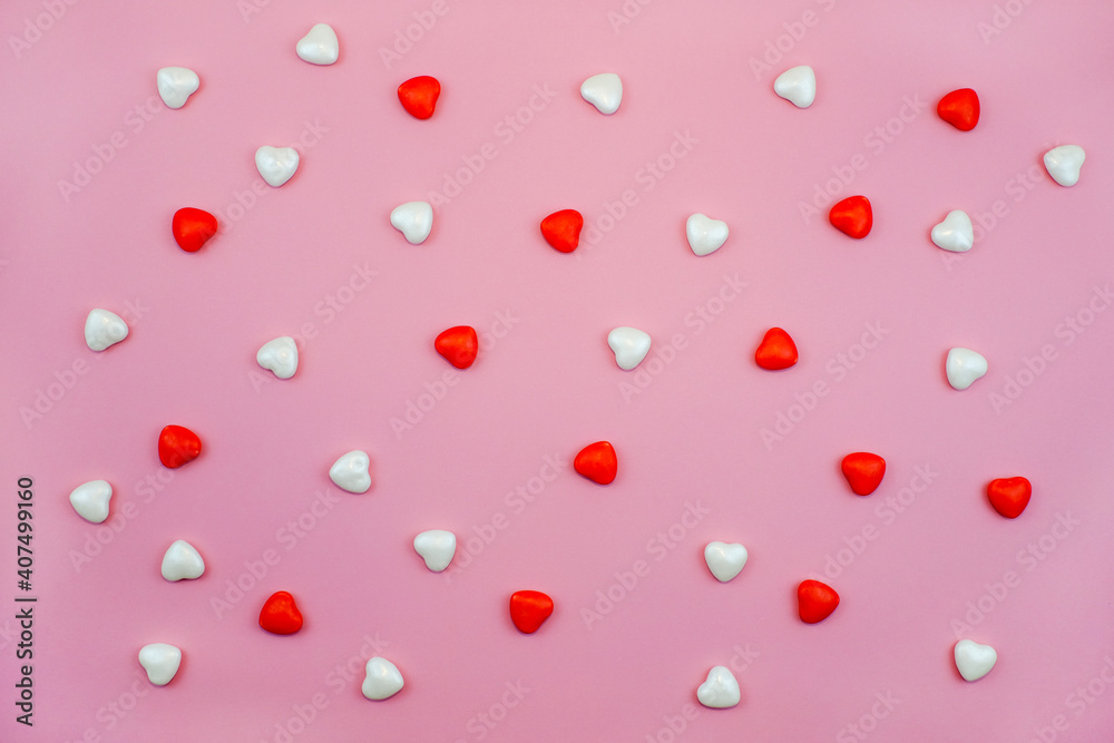Hearts sweets on pink pastel color background. Abstract background