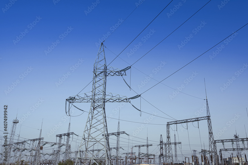 Modern electrical substation on sunny day, low angle view Modern electrical substation on sunny day, low angle view