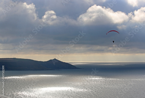 Storm Clouds and paraglider above Whitsand Bay, Cornwall 