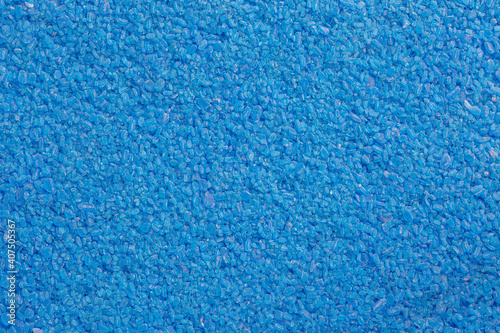Slika na platnu full frame background and texture of blue copper sulfate granules - close-up