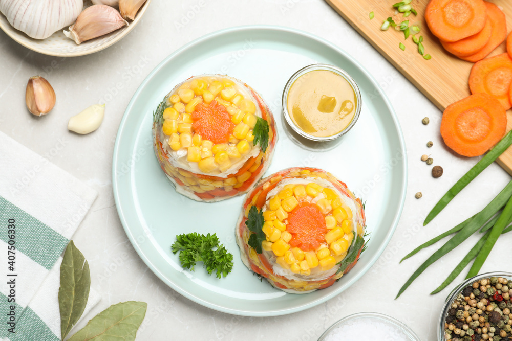 Delicious fish aspic served on light table, flat lay Delicious fish aspic served on light table, flat lay