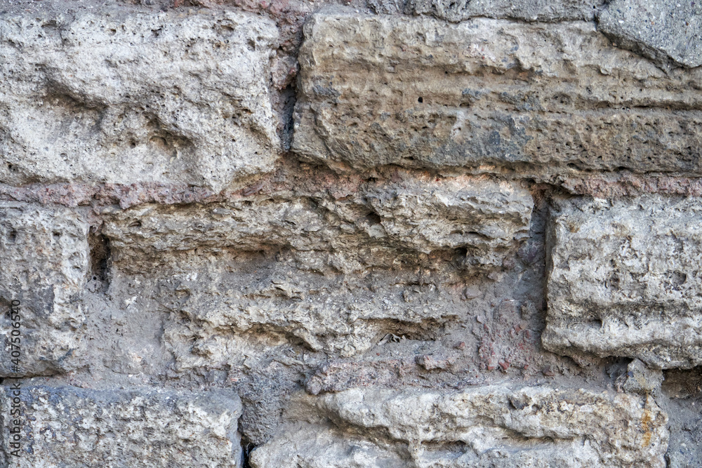 Old stone bricks wall texture close up