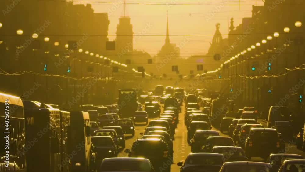 Heavy traffic on Nevsky Prospect in smog on a hot summer day. St. Petersburg, Russia. Long shot, frontal perspective, 60fps