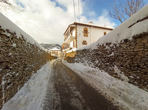 Great snowfall in Espinosa de los Monteros. A monumental and historic city that is covered in snow every year.  photo