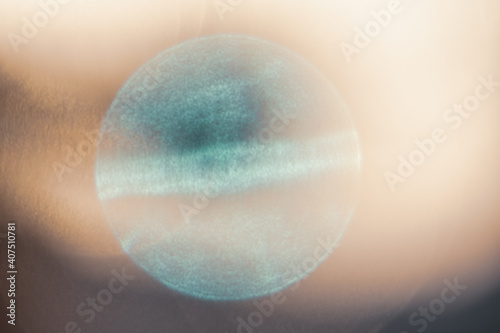 Abstract background with spheres of different colors and textures produced by flashes of sunlight passing through a crystal ball