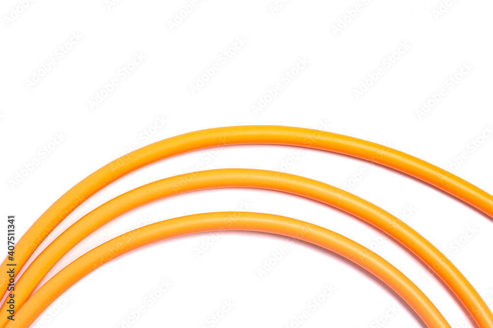 Obraz premium Orange USB rolled cable isolated on white background