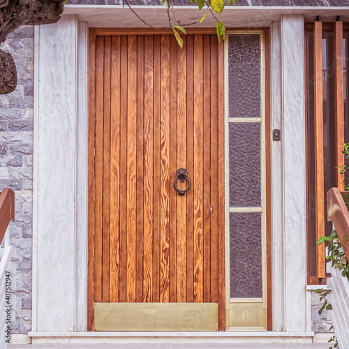 contemporary house main entrance natural wood door and side transom window