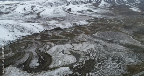 Aerial photography of the natural scenery of the wetland after the snow. Zoige, Ngawa Tibetan and Qiang Autonomous Prefecture, Sichuan, China photo