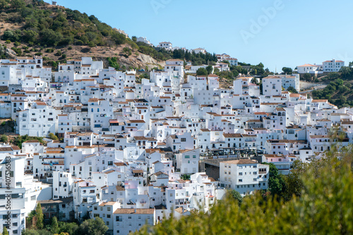Typical spanish mountain village with its narrow white buildings in Andalusia © Christoph Burgstedt