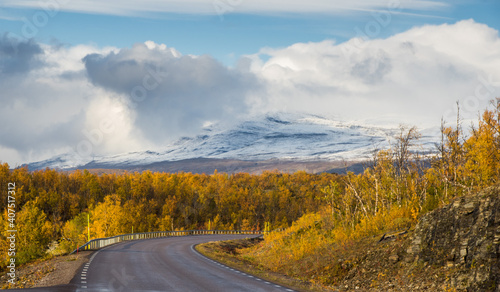 Road in a colorful autumn landscape of Lapland