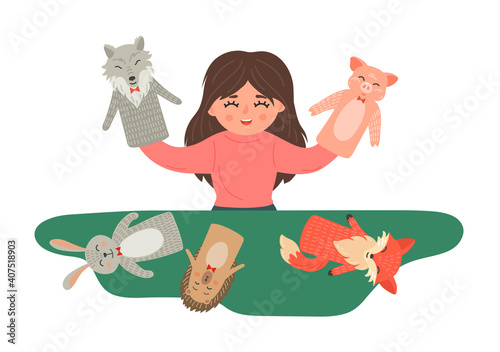 Girl shows puppet theatre show.  Kids' creativity and imagination development playing.