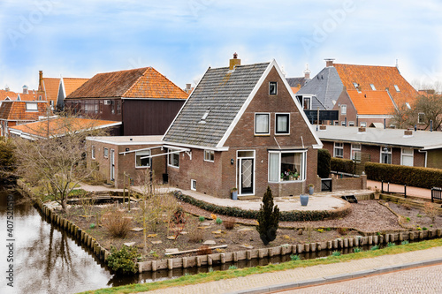 Residential buildings and canal in Hindeloopen, Netherlands, Europe