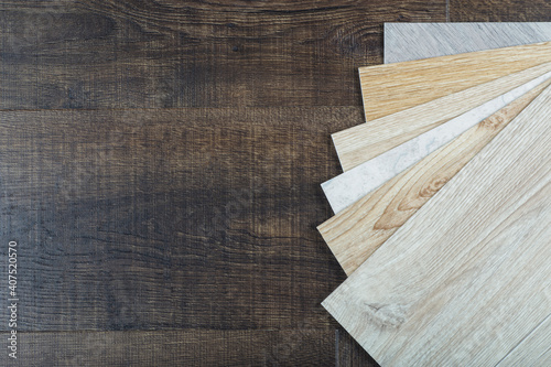 Photos Vinyl and linoleum samples on a wooden background