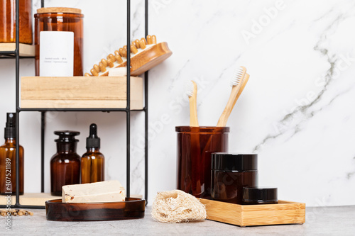 Bamboo and glass accessories for bath - jars, soap bar, brushes for personal hygiene. Zero waste, organic, plastic free, sustainable decor for bathroom