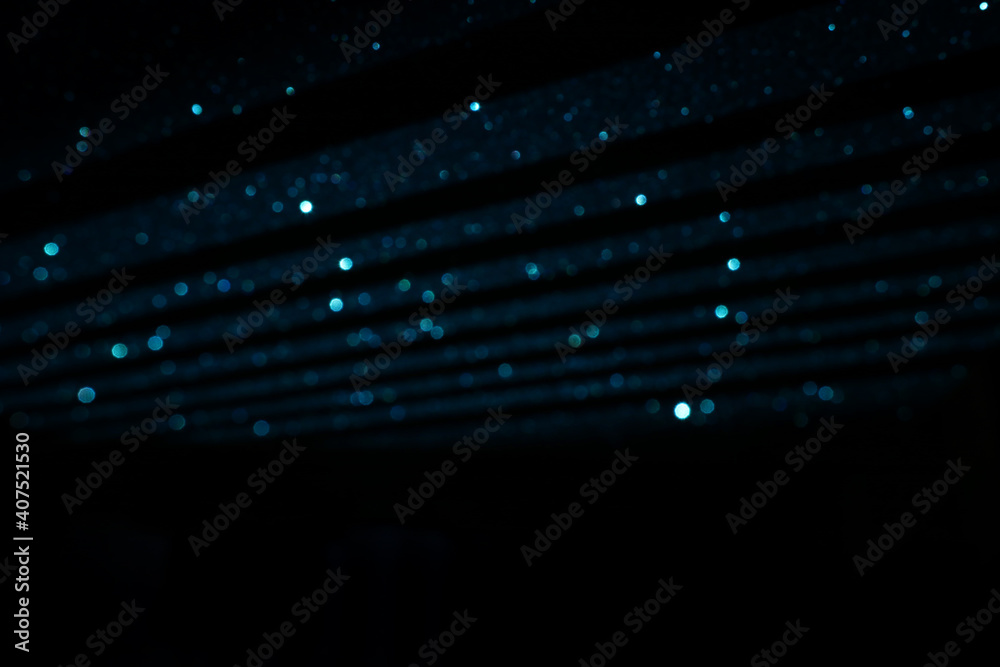 Obraz premium background of abstract gold and black glitter lights. defocused