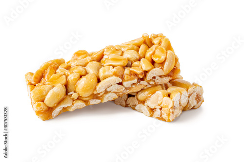 Peanut brittle bar isolated on white photo