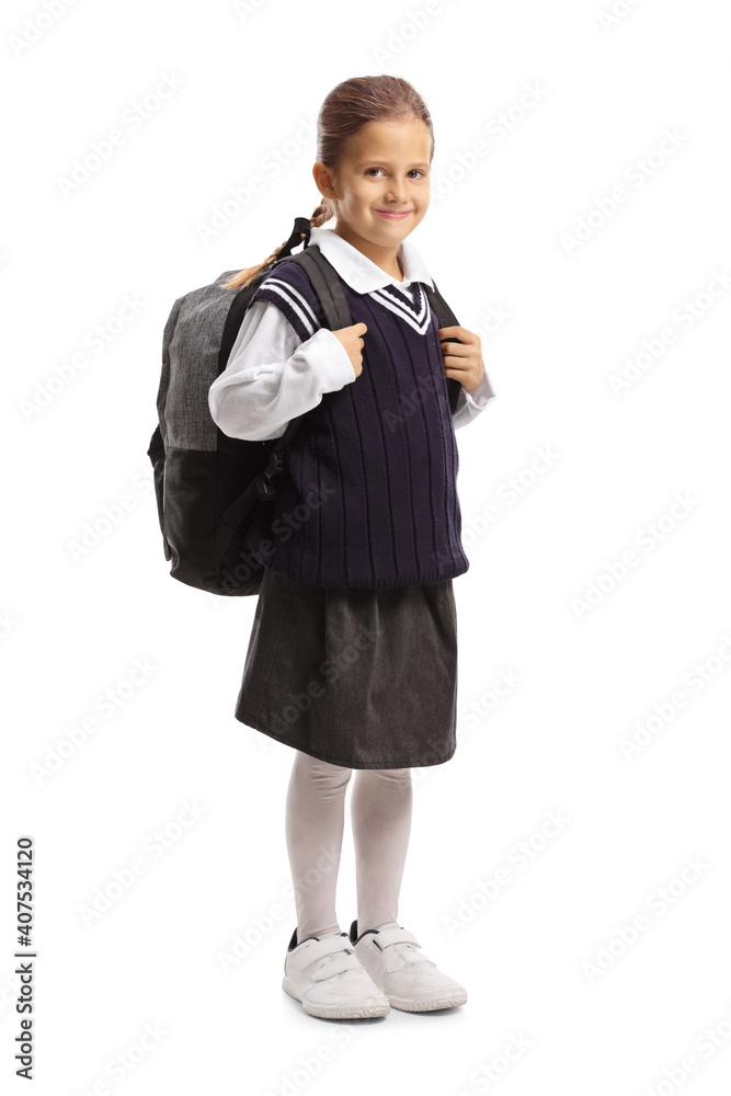Full length portrait of a smiling schoolgirl in a uniform Full length portrait of a smiling schoolgirl in a uniform