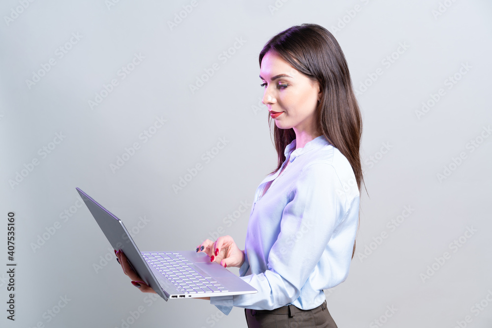 Portrait of modern woman freelancer. Works on laptop. Portrait of modern woman freelancer. Works on laptop.