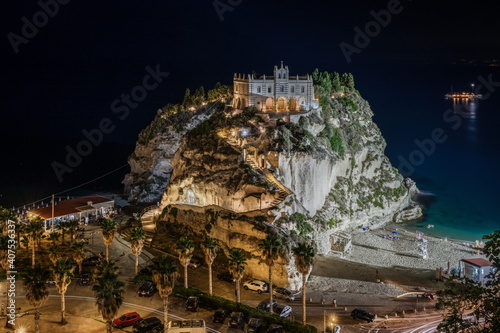 Night view of the Sanctuary of Santa Maria dell'Isola, the most famous sight of Tropea, Calabria, Italy