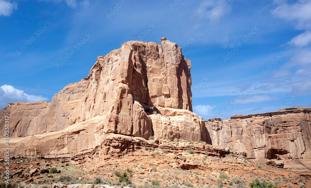 Dazzling Arches National Park in the summertime with sandstone formations on a partly cloudy day in Utah