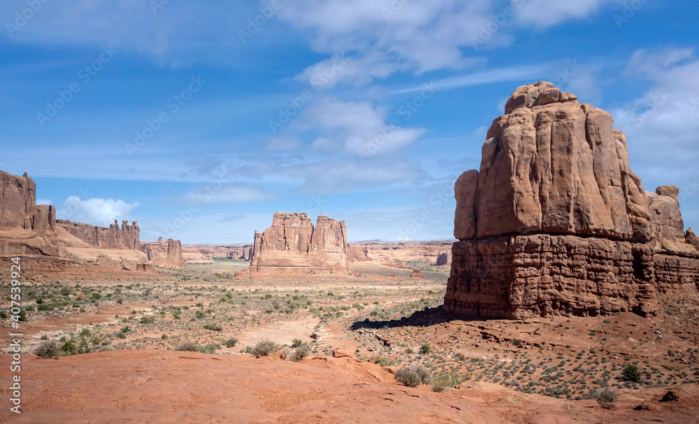 Dazzling Arches National Park in the summertime with sandstone formations on a partly cloudy day in Utah Dazzling Arches National Park in the summertime with sandstone formations on a partly cloudy day in Utah